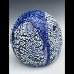 blue, black, and white orb of ceramic and glass 