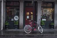 photograph of bicycle in front shop front