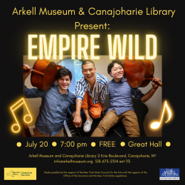 Post about the Empire Wild Concert. Image of two men holding cellos and a third sitting on top of a piano