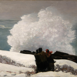 Group of three figures stands in front of a large plume of sea spray