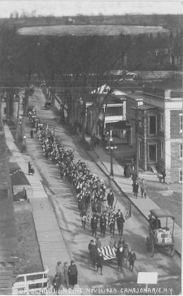 A black and white photograph of an armistice parade